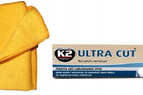 Żółta mikrofibra i pasta K2 Ultra Cut do usuwania rys z lakieru samochodowego.